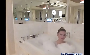 Sexy teen girl having fun in her bathroom